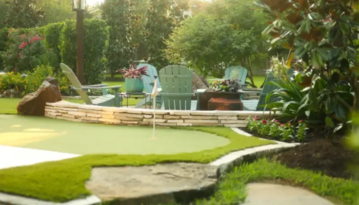 Artificial turf in low maintenance backyard.