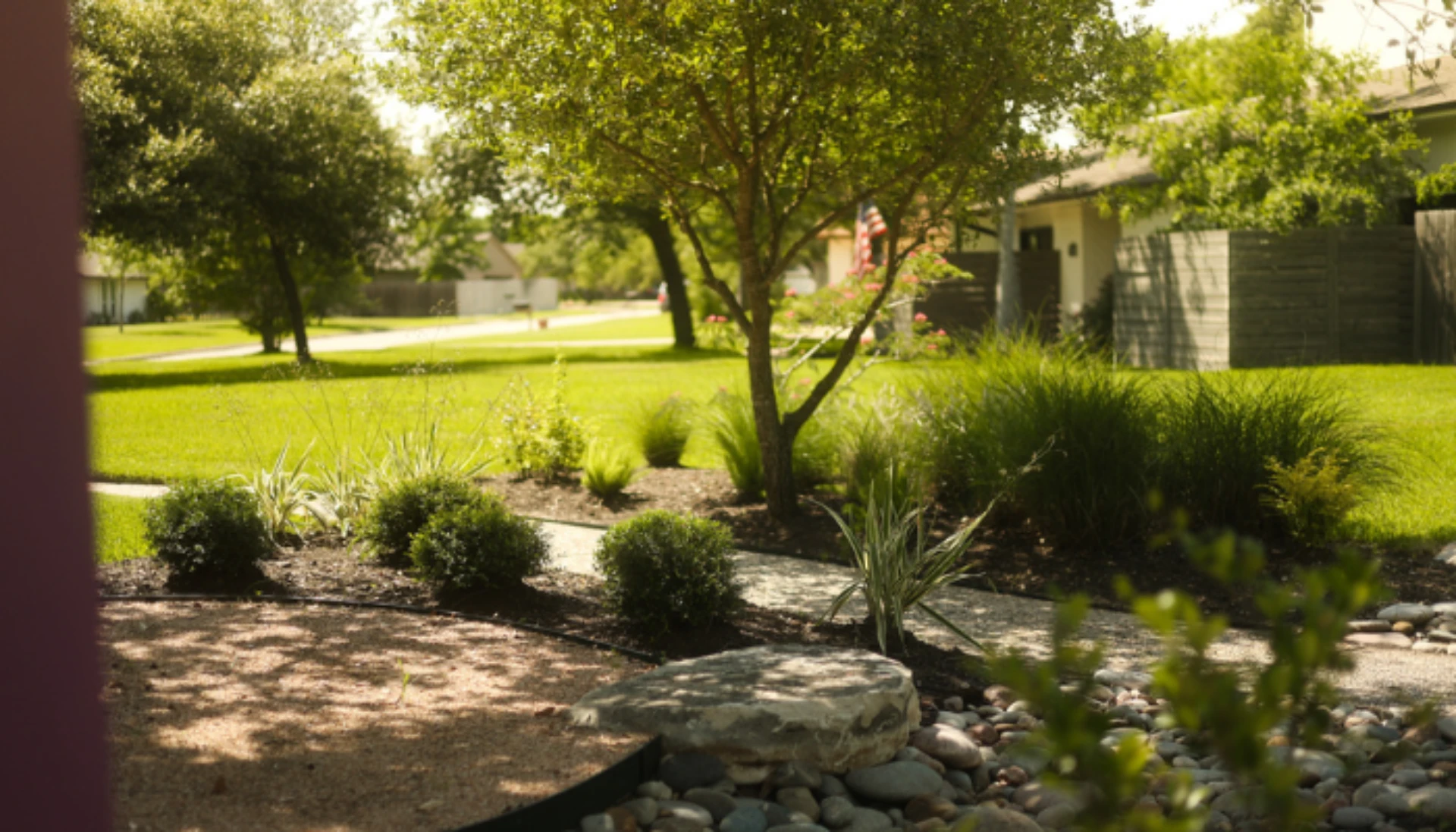 Landscaping can increase home value with a landscaped yard by Grassroots
